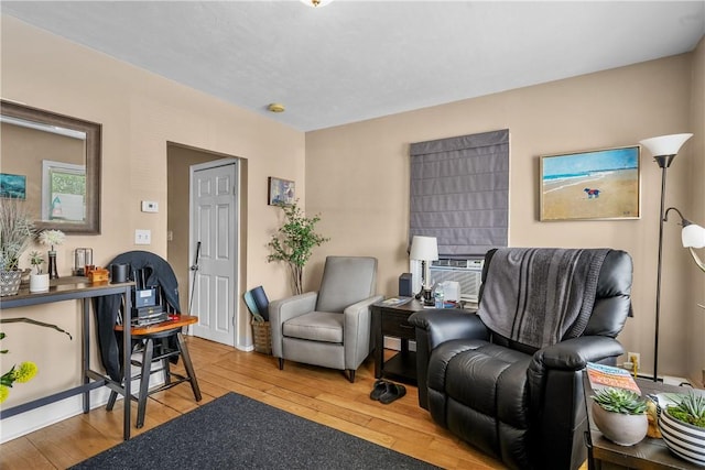 living room featuring hardwood / wood-style flooring and cooling unit