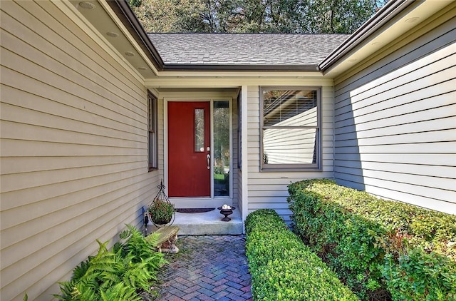 21 Fesser Ave, Bristol, RI 02809 - view of exterior entry with roof with shingles