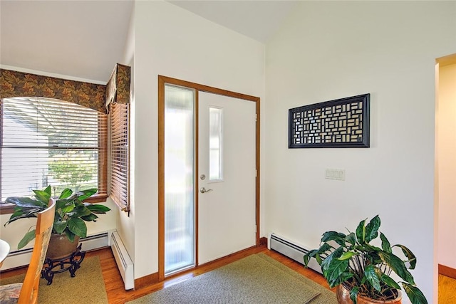 21 Fesser Ave, Bristol, RI 02809 - foyer with a baseboard heating unit, plenty of natural light, and light wood-style floors