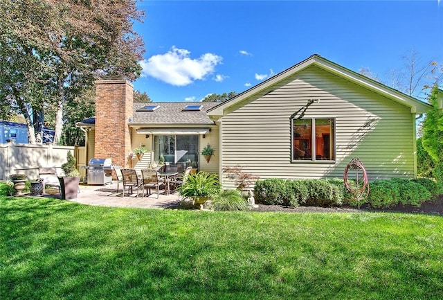 21 Fesser Ave, Bristol, RI 02809 - back of house featuring fence, a patio area, and a yard
