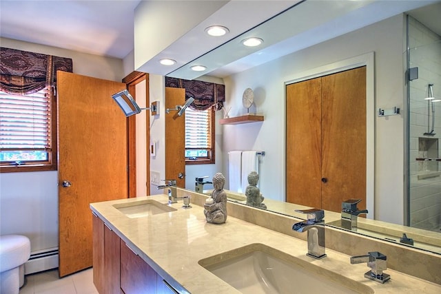 21 Fesser Ave, Bristol, RI 02809 - bathroom featuring recessed lighting, tile patterned floors, baseboard heating, and a sink
