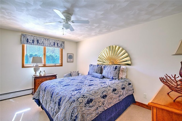 21 Fesser Ave, Bristol, RI 02809 - carpeted bedroom featuring a baseboard heating unit, baseboards, and ceiling fan