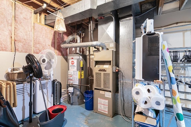 utility room featuring gas water heater