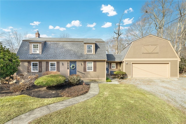 dutch colonial with a gambrel roof, dirt driveway, a front lawn, roof with shingles, and a garage