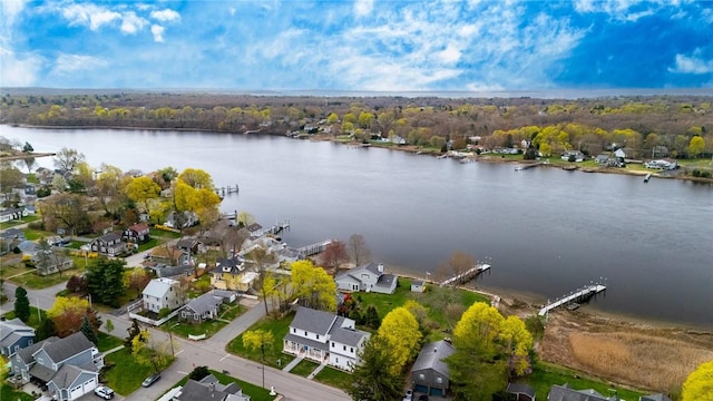 bird's eye view featuring a water view and a residential view