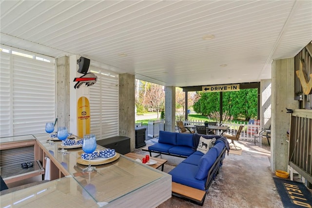 view of patio with an outdoor living space and outdoor dining space