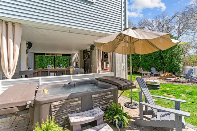 view of patio with a fire pit