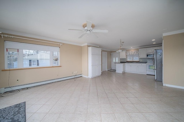 unfurnished living room featuring baseboards, recessed lighting, baseboard heating, ceiling fan, and crown molding