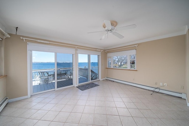 empty room with a water view, a baseboard heating unit, crown molding, baseboards, and ceiling fan