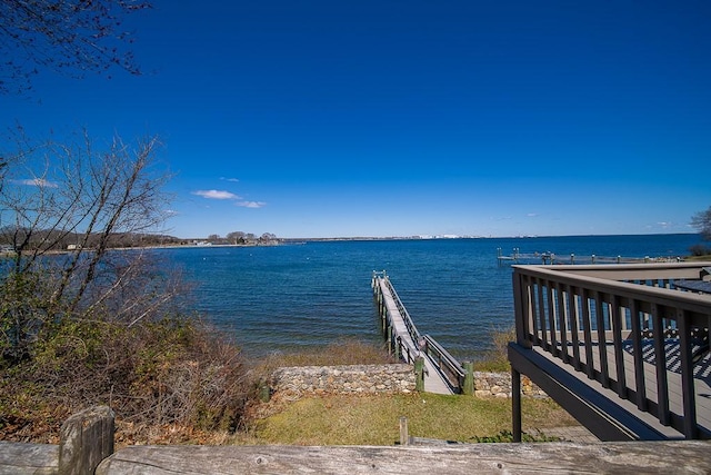 dock area featuring a water view