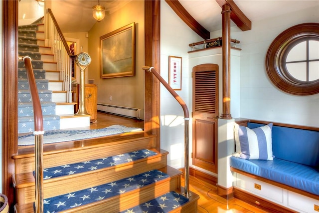 2 Harbor View Dr, Newport, RI 02840 - exercise room with vaulted ceiling, wood finished floors, and baseboard heating