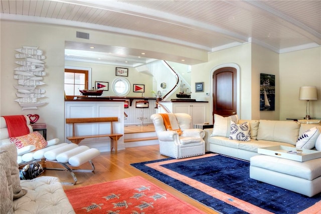 2 Harbor View Dr, Newport, RI 02840 - living room featuring crown molding, stairs, light wood finished floors, beam ceiling, and visible vents