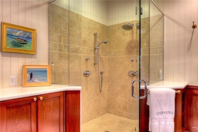 2 Harbor View Dr, Newport, RI 02840 - bathroom with wooden walls, a shower stall, and vanity