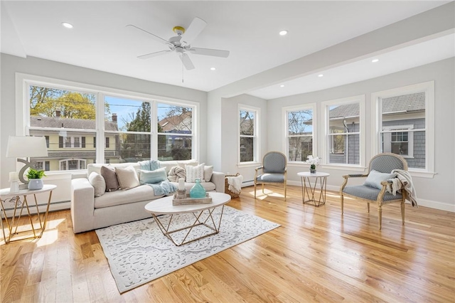 sunroom featuring a baseboard radiator