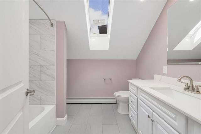 bathroom featuring baseboard heating, tile patterned flooring, vanity, toilet, and lofted ceiling