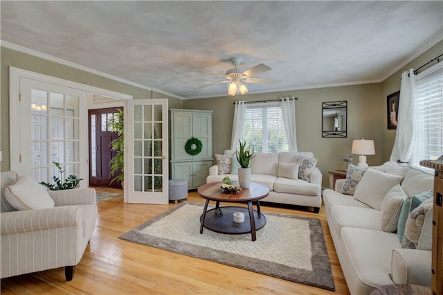 30 Rock Ridge Rd, Westerly, RI 02891 - living room featuring light wood-type flooring, ornamental molding, and a ceiling fan