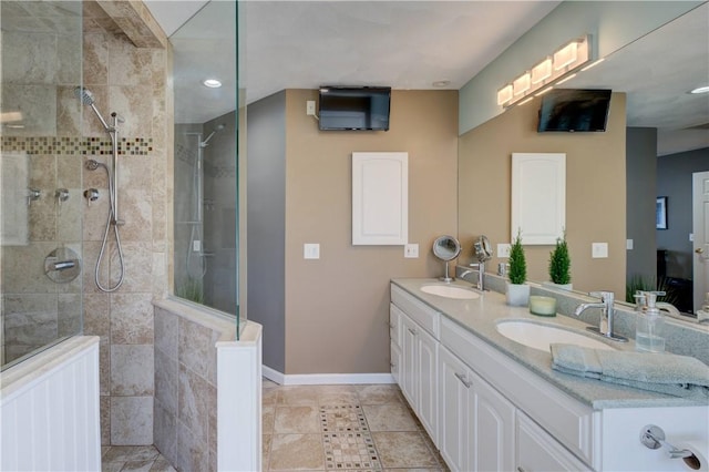 30 Rock Ridge Rd, Westerly, RI 02891 - bathroom with a sink, a walk in shower, baseboards, and double vanity