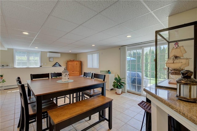 30 Rock Ridge Rd, Westerly, RI 02891 - dining room with a baseboard radiator, an AC wall unit, recessed lighting, and light tile patterned flooring