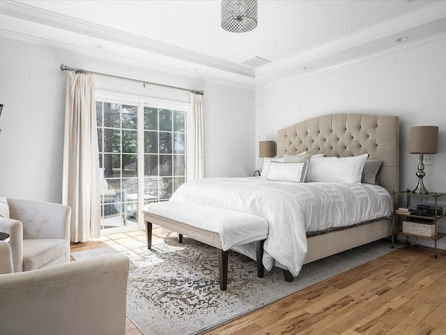 120 S Rd, East Greenwich, RI 02818 - bedroom with a raised ceiling, light wood-style floors, ornamental molding, and access to exterior