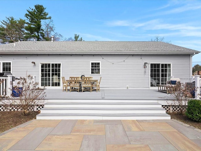 120 S Rd, East Greenwich, RI 02818 - rear view of house featuring a deck and outdoor dining space