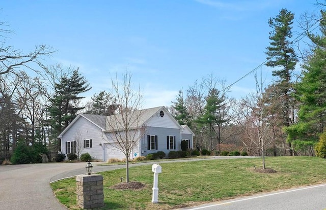 120 S Rd, East Greenwich, RI 02818 - view of front of house with a front lawn and aphalt driveway