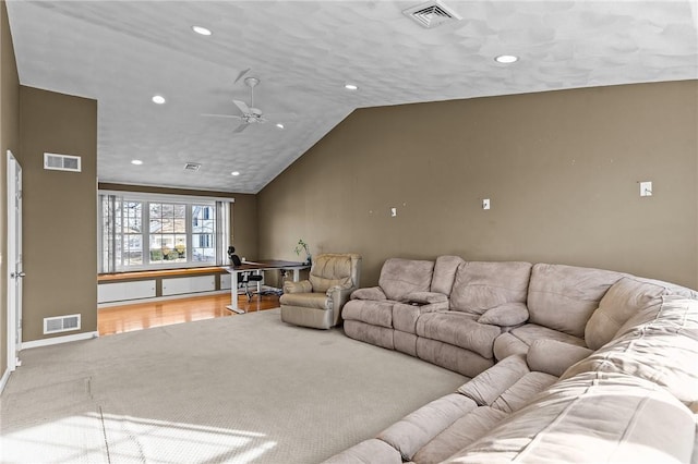 living area featuring ceiling fan, visible vents, and recessed lighting