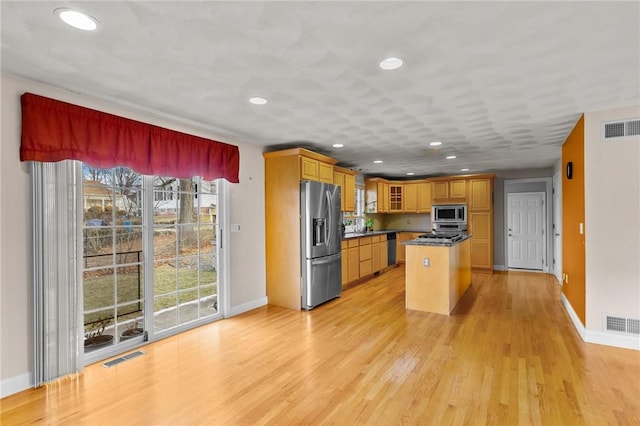 kitchen with baseboards, visible vents, recessed lighting, and appliances with stainless steel finishes