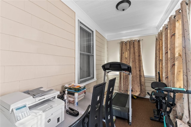 workout area with wood walls
