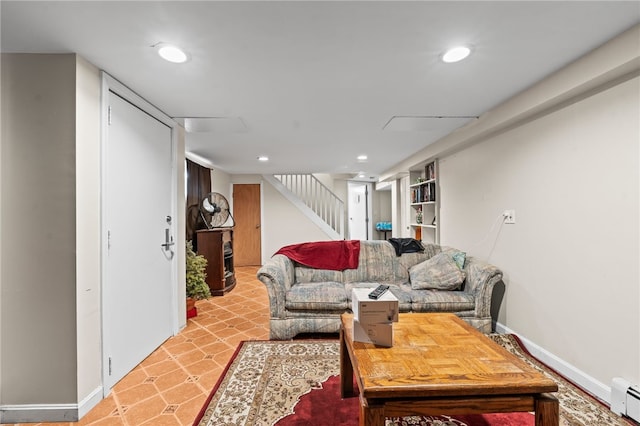 living area featuring stairway, baseboards, a baseboard heating unit, and recessed lighting