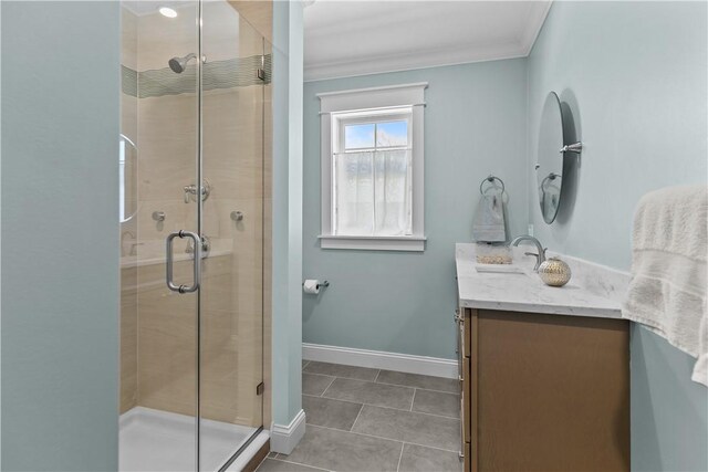 full bathroom with a shower stall, tile patterned flooring, and vanity