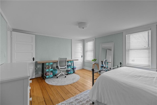 bedroom with hardwood / wood-style flooring