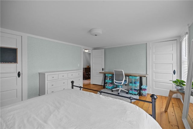 bedroom featuring hardwood / wood-style flooring