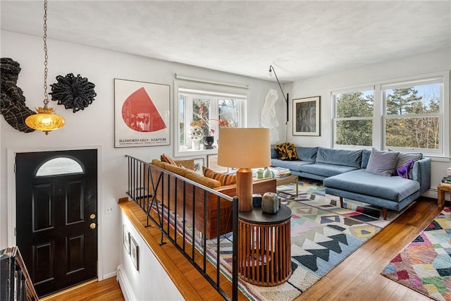 living area with hardwood / wood-style floors