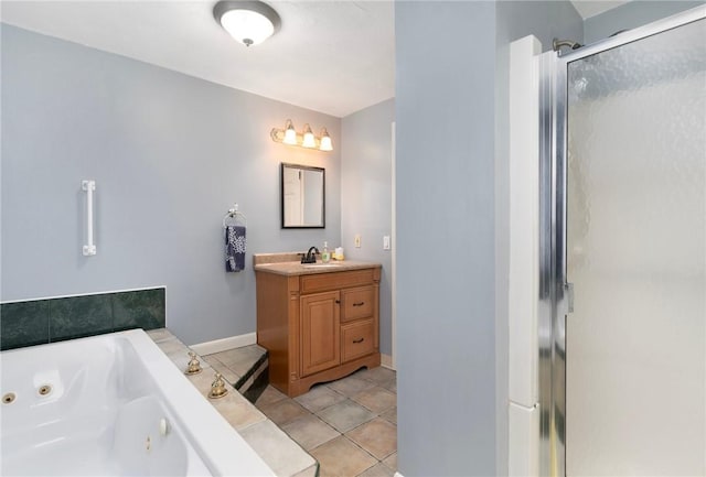 full bath with baseboards, a whirlpool tub, a shower stall, and vanity