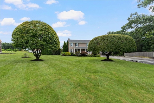 view of yard with fence