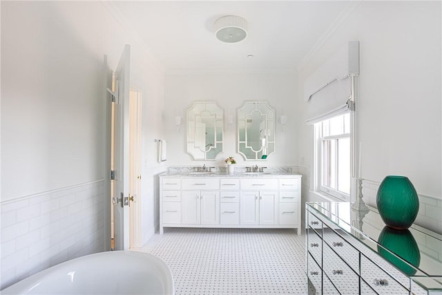 78 Rhode Island Ave Unit 8, Newport, RI 02840 - bathroom with crown molding, double vanity, a sink, and a freestanding tub