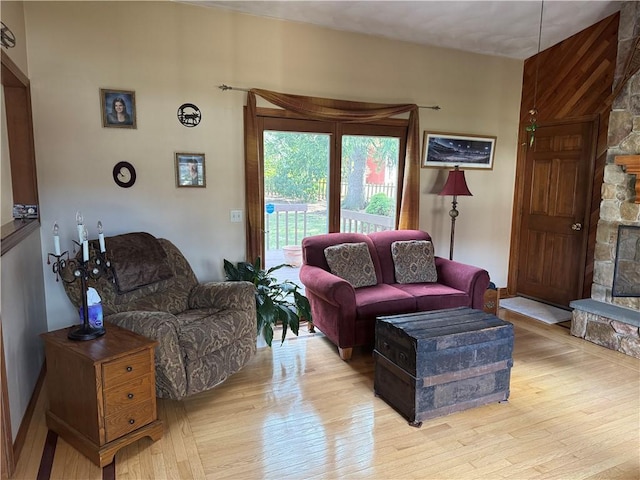 living room featuring light wood-style floors and baseboards