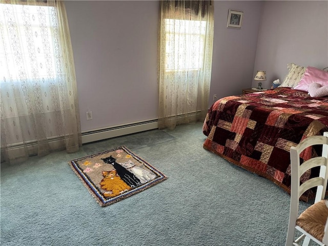 bedroom featuring a baseboard radiator and carpet floors
