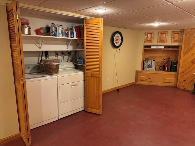 clothes washing area with separate washer and dryer and laundry area