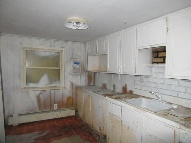 171 Pulaski Rd, Burrillville, RI 02830 - kitchen with white cabinets, a sink, baseboard heating, open shelves, and light countertops