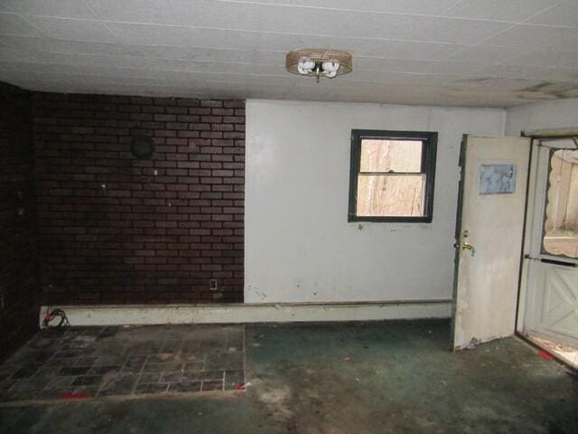 171 Pulaski Rd, Burrillville, RI 02830 - spare room featuring baseboards and unfinished concrete floors