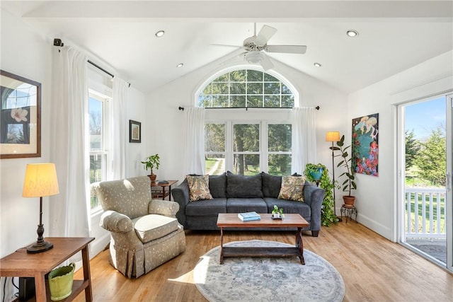 interior space featuring vaulted ceiling and a healthy amount of sunlight