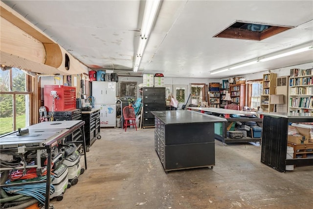 miscellaneous room with a workshop area