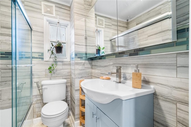 134 Courtland St, Providence, RI 02909 - full bath with toilet, vanity, and tile walls