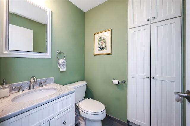 183 Twin Peninsula Ave, South Kingstown, RI 02879 - bathroom with toilet, vanity, and tile patterned flooring