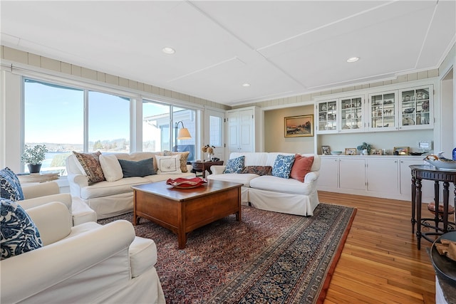 183 Twin Peninsula Ave, South Kingstown, RI 02879 - living area with light wood-style floors and recessed lighting