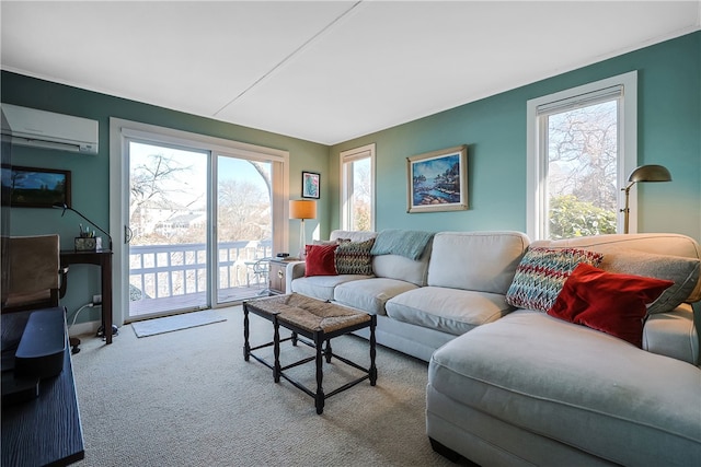 183 Twin Peninsula Ave, South Kingstown, RI 02879 - carpeted living area featuring a wall unit AC and plenty of natural light