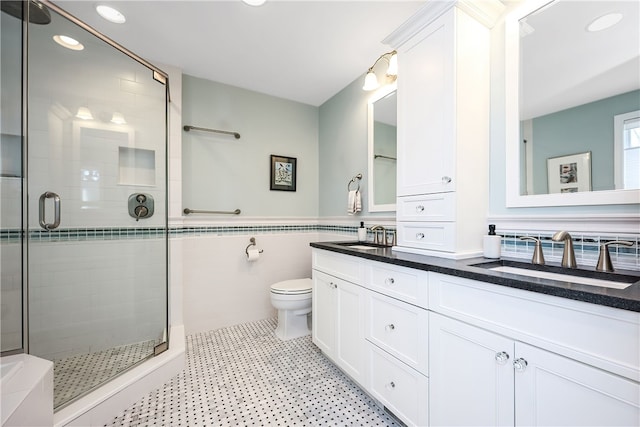 183 Twin Peninsula Ave, South Kingstown, RI 02879 - full bath featuring a stall shower, double vanity, recessed lighting, toilet, and tile patterned floors
