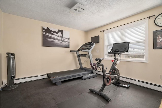 465 Camp Dixie Rd, Burrillville, RI 02859 - exercise room with a textured ceiling and a baseboard heating unit