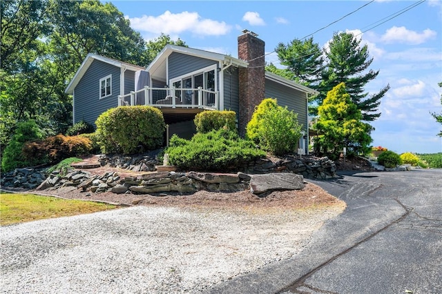 465 Camp Dixie Rd, Burrillville, RI 02859 - view of front of house with a chimney